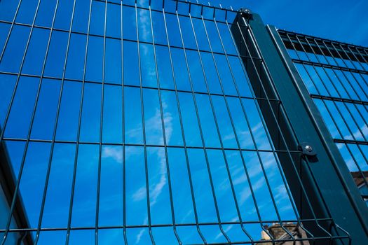 Black metal security gates protecting business property