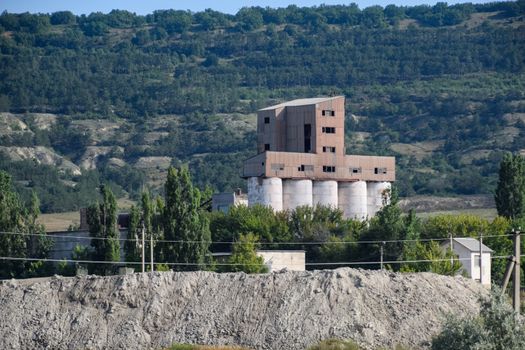 An old abandoned Soviet grain terminal. The grain elevator.