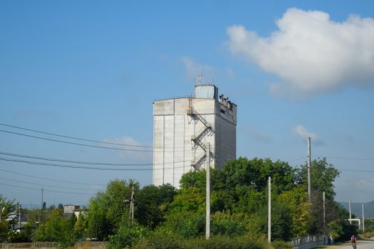 An old abandoned Soviet grain terminal. The grain elevator.