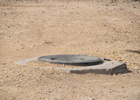 a Construction of sewer hatches. Sewer installation.