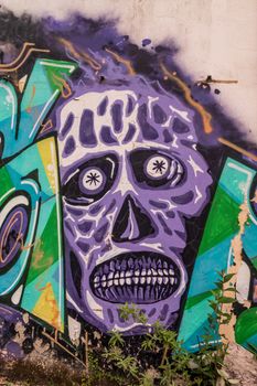 mural image of a zombie skull, wall paint in a horror theme