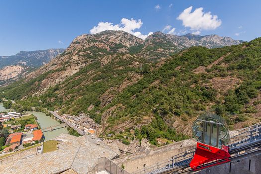 View from Forte Bard of the narrow gorge where the Dora Baltea flows, landscape of the Aosta Valley in Italy