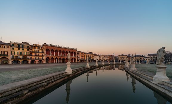 Prato della Valle, square in the city of Padua with the Memmia island surrounded by a canal surrounded by 87 statues, Italian cityscape