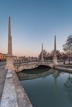 Prato della Valle, square in the city of Padua with the Memmia island surrounded by a canal surrounded by 87 statues, Italian cityscape