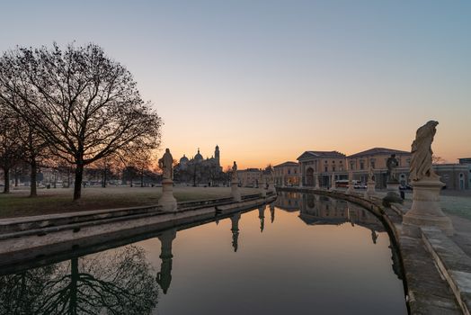 Prato della Valle, square in the city of Padua with the Memmia island surrounded by a canal surrounded by 87 statues, Italian cityscape