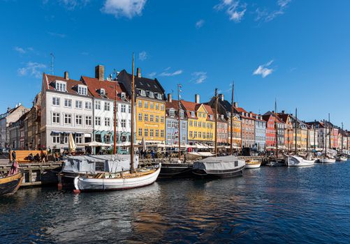 Landscape of the ancient port of Nyhavn in Copenhagen in Denmark, channel European tourist destination