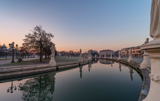 Prato della Valle, square in the city of Padua with the Memmia island surrounded by a canal surrounded by 87 statues, Italian cityscape