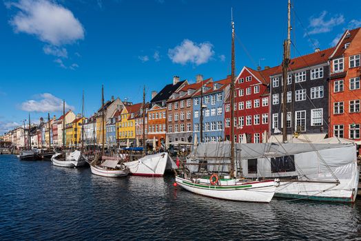 Landscape of the ancient port of Nyhavn in Copenhagen in Denmark, channel European tourist destination