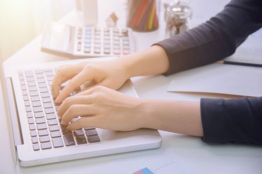 A young business woman using laptop computer on the table, Looking for direction and inspiration.