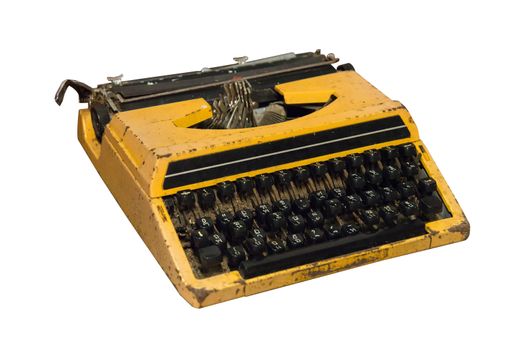 Rusty old vintage yellow typewriter isolated on white background, work with clipping path.