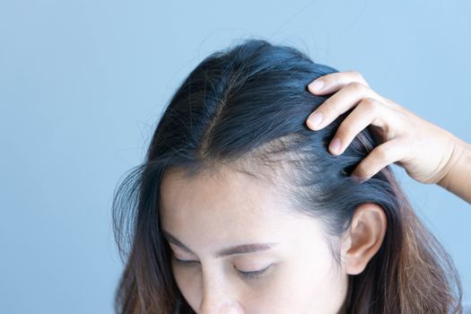 Woman serious hair loss problem for health care shampoo and beauty product concept, selective focus