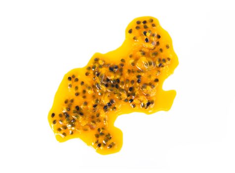 Closeup top view passion fruit seed drop on white background, fruit for healthy concept