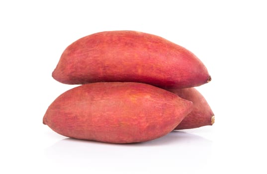 Raw sweet potato isolated on white background, healthy food concept