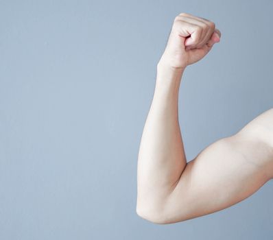 Back arm muscle man with grey background, health care and medical concept