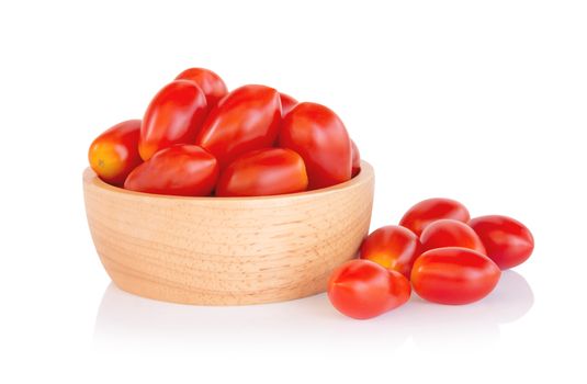 Cherry tomatoes in wood bowl isolated on white background, food healhty concept