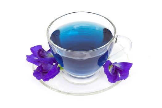 Glass of butterfly pea juice on white background, herb and medical concept