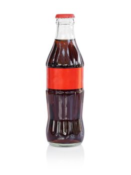 Glass bottle of Coca-Cola isolated on white background