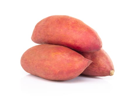 Raw sweet potato isolated on white background, healthy food concept