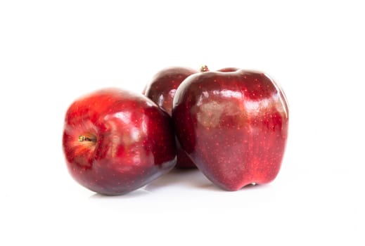 Fresh red apple fruit with green leaf isolated on white background, Healthy food concept