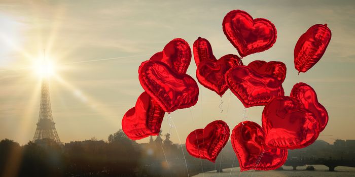Heart balloons against eiffel tower