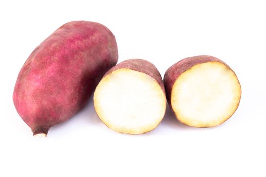 Raw sweet potato isolated on white background, healthy food concept