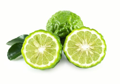 Fresh bergamot fruit slice with green leaf isolated on white background, herb and medical