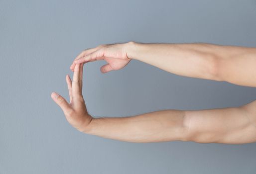 stretching exercises finger on grey background, health care and medical concept