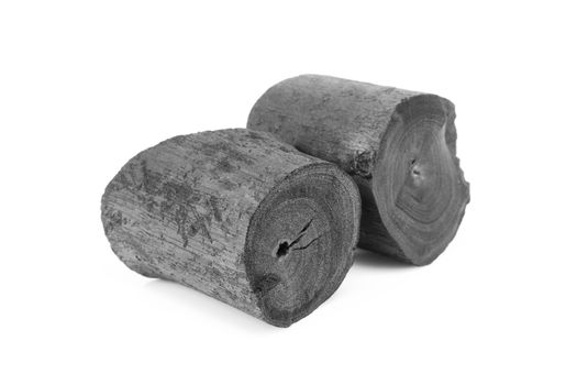 Natural black charcoal isolated on white background