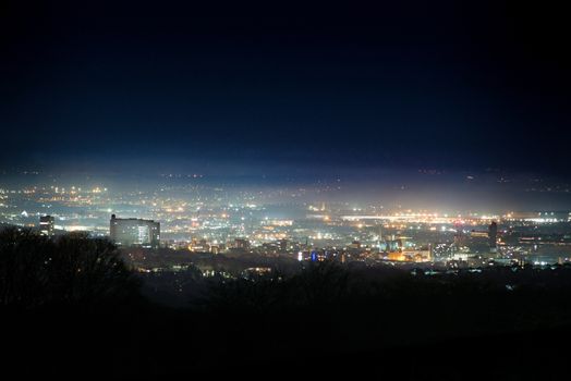 looking from the west over sheffield's skyline at night, featuring the royal hallamshire hospital