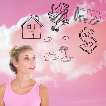 Pretty young blonde in pink looking up against cloudy sky