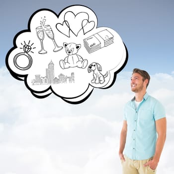 Handsome young man posing with hands in pockets against bright blue sky over clouds