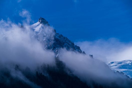 Chamonix needle with fog in the French Alps