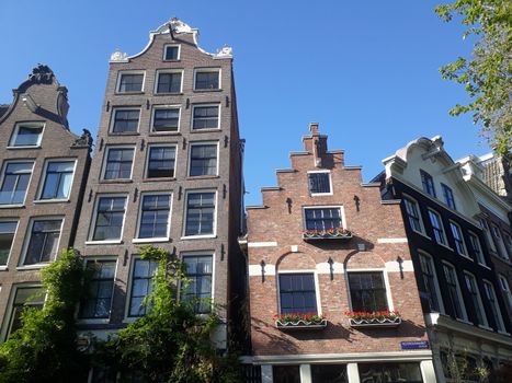 amsterdam architecture tall houses with gable ends tall apartments and offices in historic holland capital city