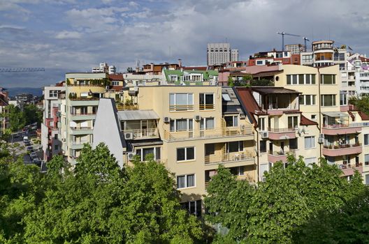 Residential neighborhood with new modern houses against the backdrop of a cityscape in the Bulgarian capital Sofia, Bulgaria