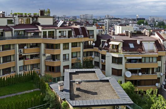 Green gardens with a place for recreation in a new residential neighborhood of the Bulgarian capital Sofia, Bulgaria