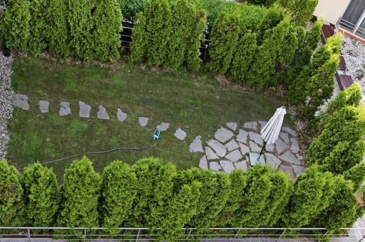 Green gardens with a place for recreation in a new residential neighborhood of the Bulgarian capital Sofia, Bulgaria