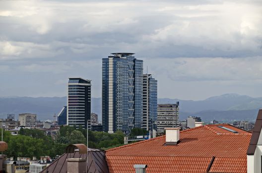 Residential neighborhood with new modern houses against the backdrop of a cityscape in the Bulgarian capital Sofia, Bulgaria