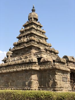 Shore temple is the structural building built with the block of granite at 8th Century AD. It is one of the Group of Monuments at Mahabalipuram and it has been classified as a UNESCO World Heritage Site. Shore temple is the oldest structural rock-cut stone temples of South India and contains complex of temples and shrines. This temple complex is initiated by King  Narasimhavarman II and it is called one of the Seven Pagodas in ancient times.