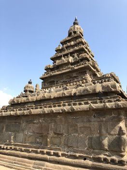Shore temple is the structural building built with the block of granite at 8th Century AD. It is one of the Group of Monuments at Mahabalipuram and it has been classified as a UNESCO World Heritage Site. Shore temple is the oldest structural rock-cut stone temples of South India and contains complex of temples and shrines. This temple complex is initiated by King  Narasimhavarman II and it is called one of the Seven Pagodas in ancient times.