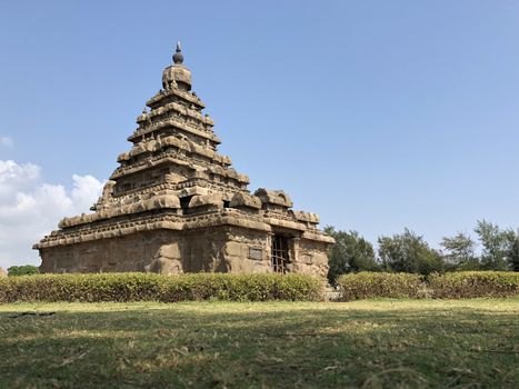 Shore temple is the structural building built with the block of granite at 8th Century AD. It is one of the Group of Monuments at Mahabalipuram and it has been classified as a UNESCO World Heritage Site. Shore temple is the oldest structural rock-cut stone temples of South India and contains complex of temples and shrines. This temple complex is initiated by King  Narasimhavarman II and it is called one of the Seven Pagodas in ancient times.