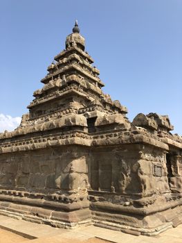 Shore temple is the structural building built with the block of granite at 8th Century AD. It is one of the Group of Monuments at Mahabalipuram and it has been classified as a UNESCO World Heritage Site. Shore temple is the oldest structural rock-cut stone temples of South India and contains complex of temples and shrines. This temple complex is initiated by King  Narasimhavarman II and it is called one of the Seven Pagodas in ancient times.