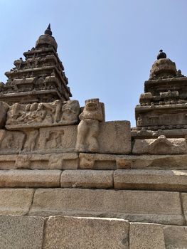 Shore temple is the structural building built with the block of granite at 8th Century AD. It is one of the Group of Monuments at Mahabalipuram and it has been classified as a UNESCO World Heritage Site. Shore temple is the oldest structural rock-cut stone temples of South India and contains complex of temples and shrines. This temple complex is initiated by King  Narasimhavarman II and it is called one of the Seven Pagodas in ancient times.
