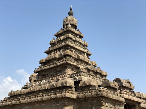 Shore temple is the structural building built with the block of granite at 8th Century AD. It is one of the Group of Monuments at Mahabalipuram and it has been classified as a UNESCO World Heritage Site. Shore temple is the oldest structural rock-cut stone temples of South India and contains complex of temples and shrines. This temple complex is initiated by King  Narasimhavarman II and it is called one of the Seven Pagodas in ancient times.