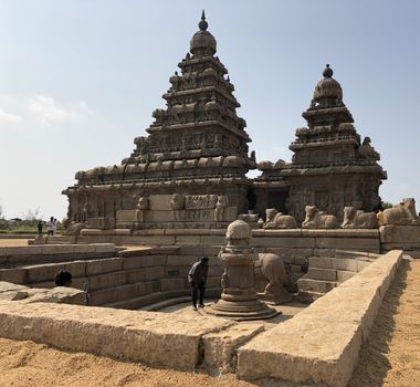 Shore temple is the structural building built with the block of granite at 8th Century AD. It is one of the Group of Monuments at Mahabalipuram and it has been classified as a UNESCO World Heritage Site. Shore temple is the oldest structural rock-cut stone temples of South India and contains complex of temples and shrines. This temple complex is initiated by King  Narasimhavarman II and it is called one of the Seven Pagodas in ancient times.