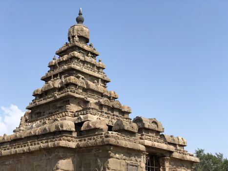 Shore temple is the structural building built with the block of granite at 8th Century AD. It is one of the Group of Monuments at Mahabalipuram and it has been classified as a UNESCO World Heritage Site. Shore temple is the oldest structural rock-cut stone temples of South India and contains complex of temples and shrines. This temple complex is initiated by King  Narasimhavarman II and it is called one of the Seven Pagodas in ancient times.