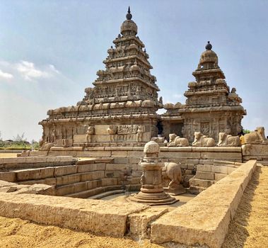 Shore temple is the structural building built with the block of granite at 8th Century AD. It is one of the Group of Monuments at Mahabalipuram and it has been classified as a UNESCO World Heritage Site. Shore temple is the oldest structural rock-cut stone temples of South India and contains complex of temples and shrines. This temple complex is initiated by King  Narasimhavarman II and it is called one of the Seven Pagodas in ancient times.