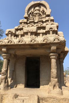 Nakula Sahadeva Ratha is a monument in the Pancha Rathas is an example of monolith Indian rock-cut architecture. Resembling a chariot ratha, it is carved out of a single, long stone of pink granite. This is one of the Group of Monuments at Mahabalipuram and also a UNESCO World Heritage Site.