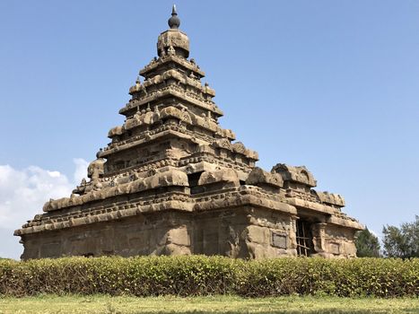 Shore temple is the structural building built with the block of granite at 8th Century AD. It is one of the Group of Monuments at Mahabalipuram and it has been classified as a UNESCO World Heritage Site. Shore temple is the oldest structural rock-cut stone temples of South India and contains complex of temples and shrines. This temple complex is initiated by King  Narasimhavarman II and it is called one of the Seven Pagodas in ancient times.