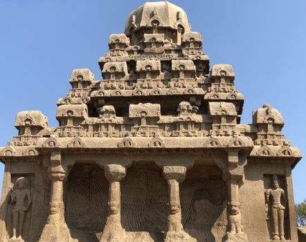 Dharmaraja Ratha is a monument in the Pancha Rathas is an example of monolith Indian rock-cut architecture. Resembling a chariot ratha, it is carved out of a single, long stone of pink granite. This is one of the Group of Monuments at Mahabalipuram and also a UNESCO World Heritage Site. The unfinished structure is dedicated to the Lord Shiva.
