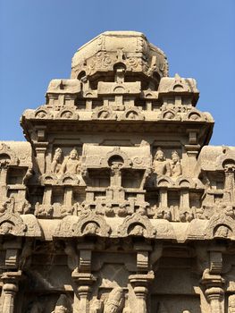 Dharmaraja Ratha is a monument in the Pancha Rathas is an example of monolith Indian rock-cut architecture. Resembling a chariot ratha, it is carved out of a single, long stone of pink granite. This is one of the Group of Monuments at Mahabalipuram and also a UNESCO World Heritage Site. The unfinished structure is dedicated to the Lord Shiva.